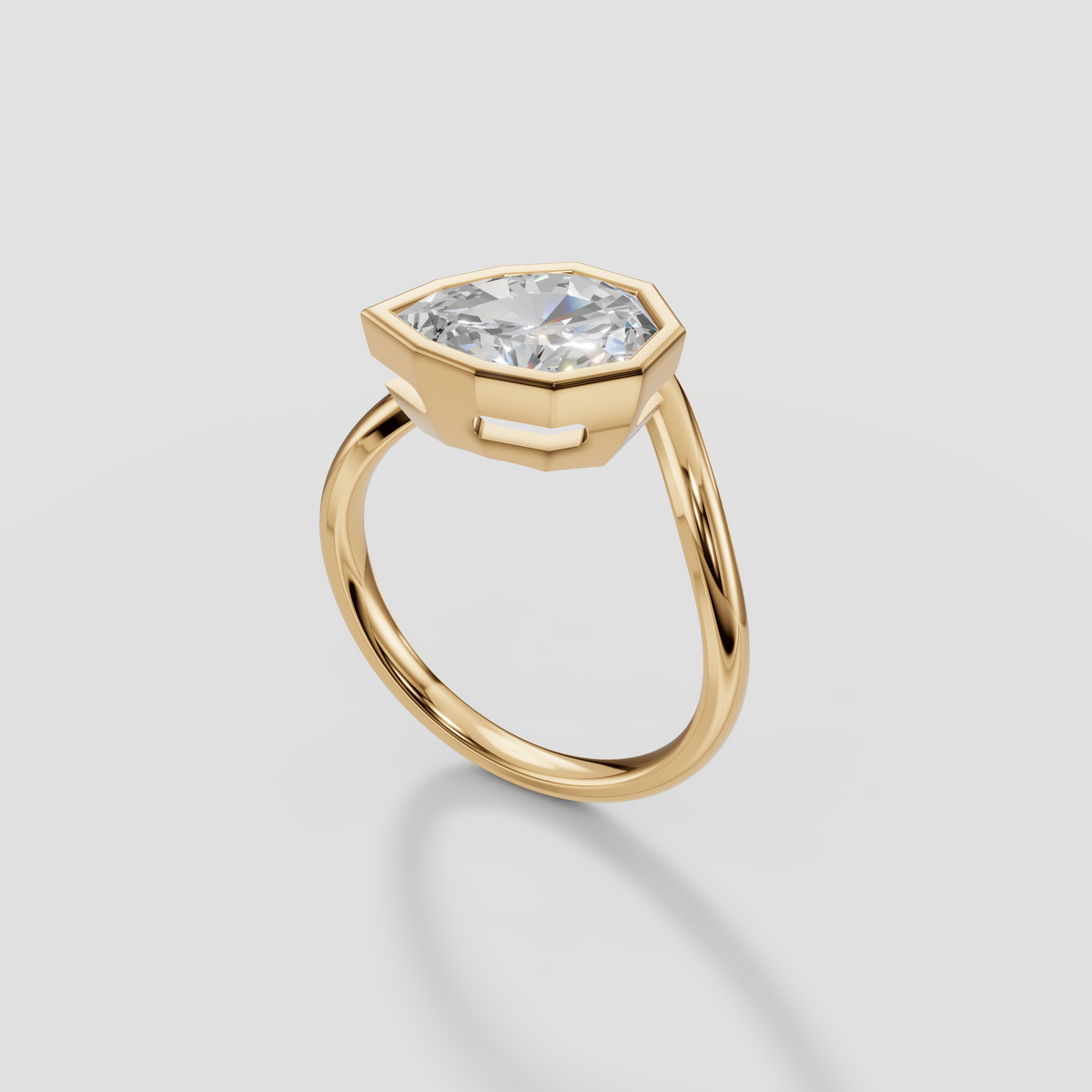 Geometric Shield Cut Diamond Bezel Engagement Ring in Solid Gold