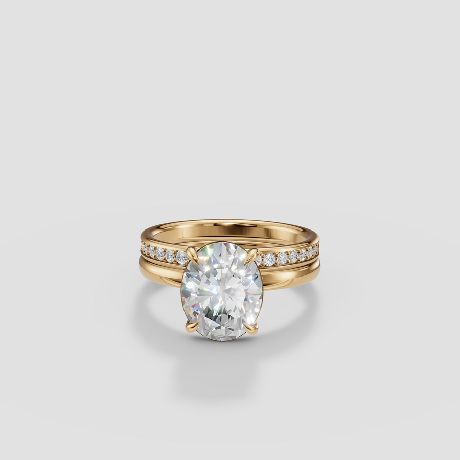 Elara Oval Diamond Ring and Matching Pave Engagement Ring in 14 Yellow Gold