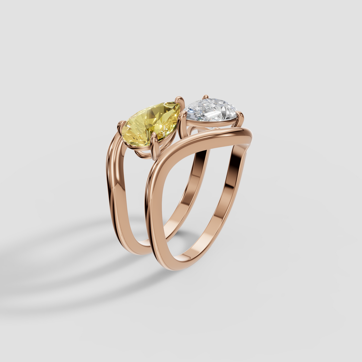 Yellow and White Pear Diamond Toi et Moi Wave Ring in 14K Gold