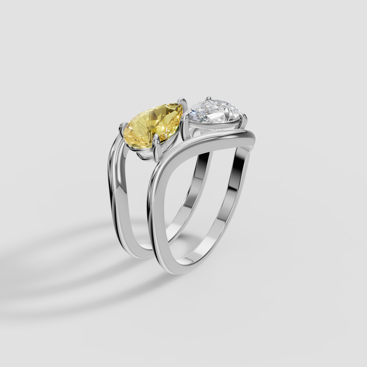 Yellow and White Pear Diamond Toi et Moi Wave Ring in 14K Gold