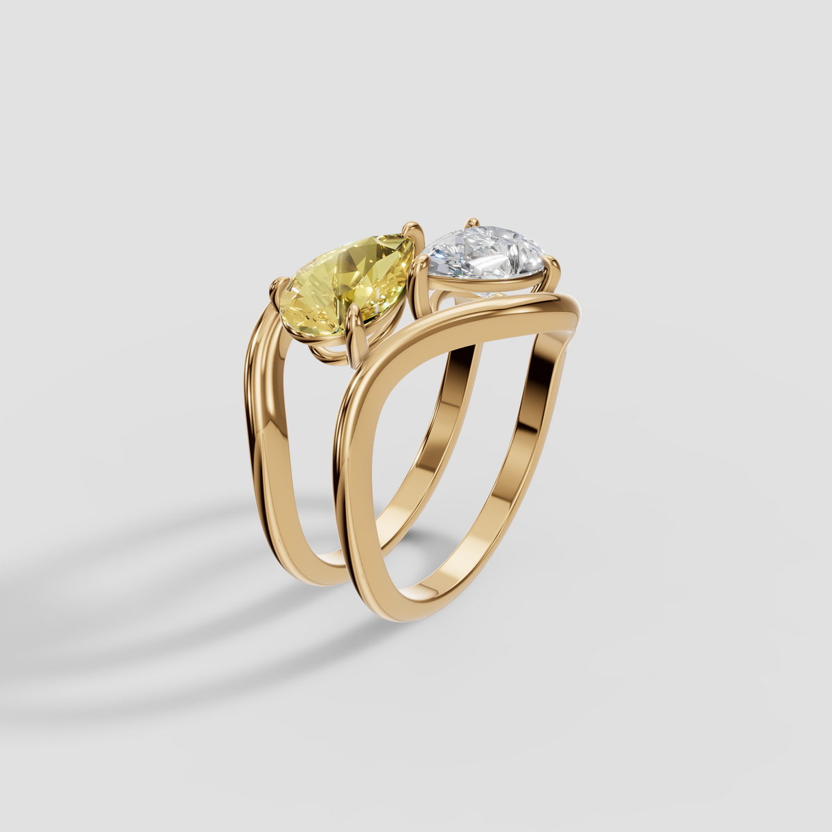 Yellow and White Pear Diamond Toi et Moi Wave Ring in 14K Gold