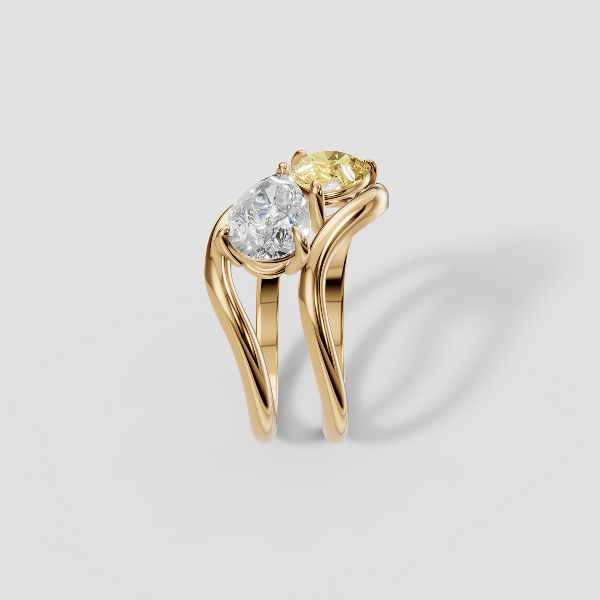 Yellow and White Pear Diamond Toi et Moi Wave Ring in 14K Gold
