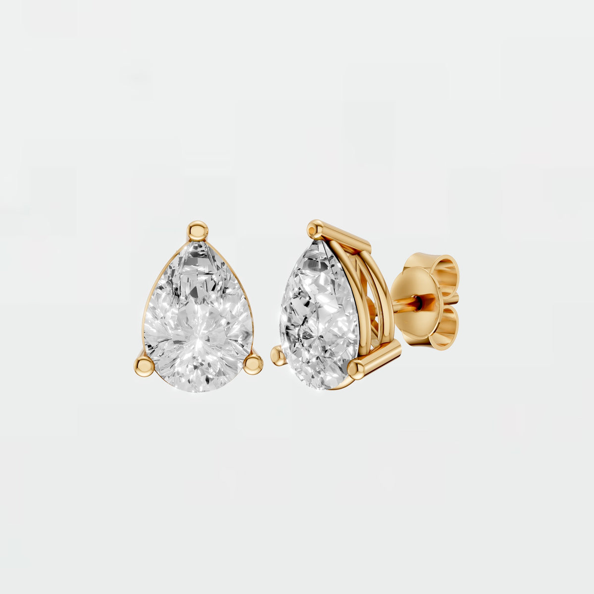 Pear Cut Diamond Stud Earrings with Modern Basket Setting