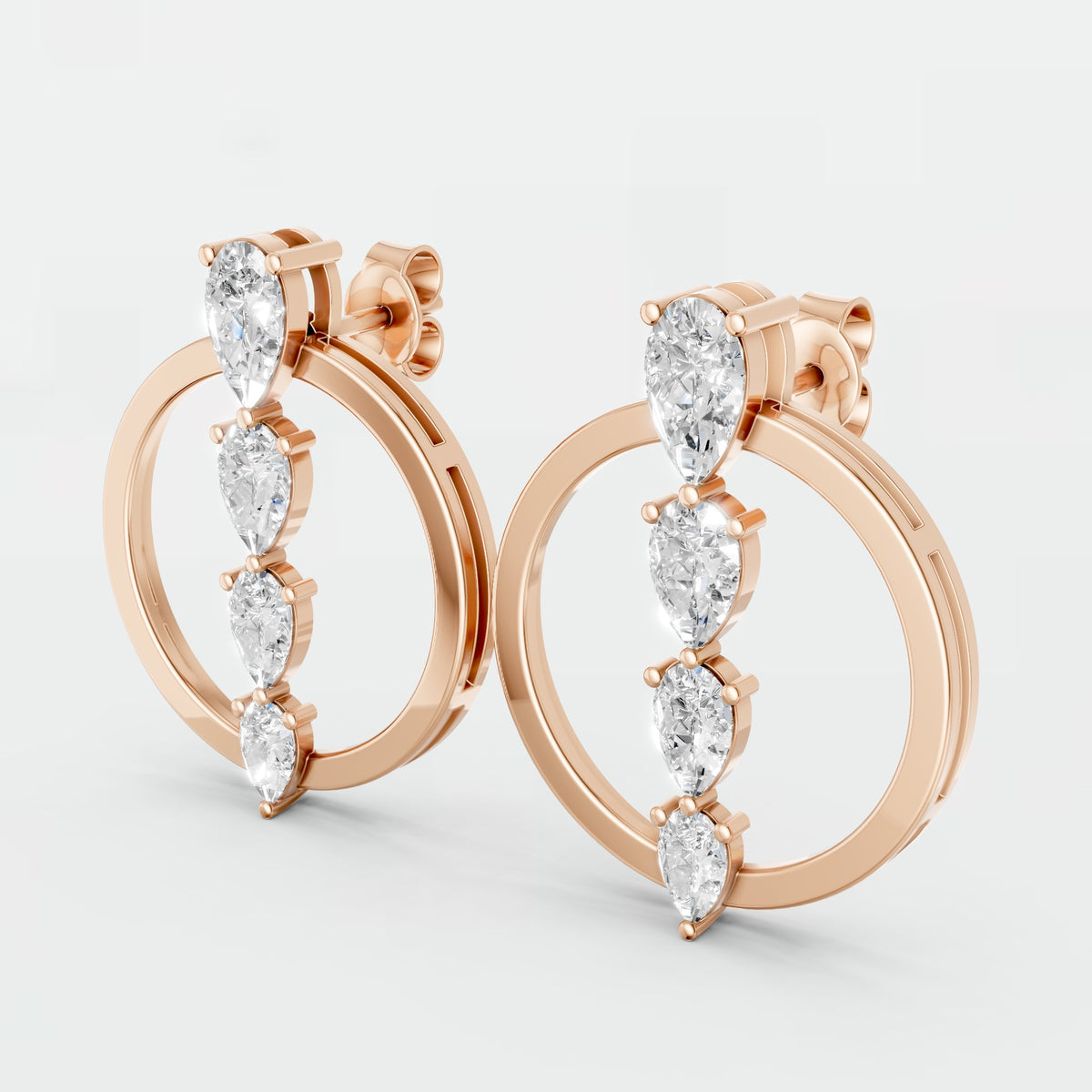 Elara Pear Diamond Circle Graduated Drop Earrings