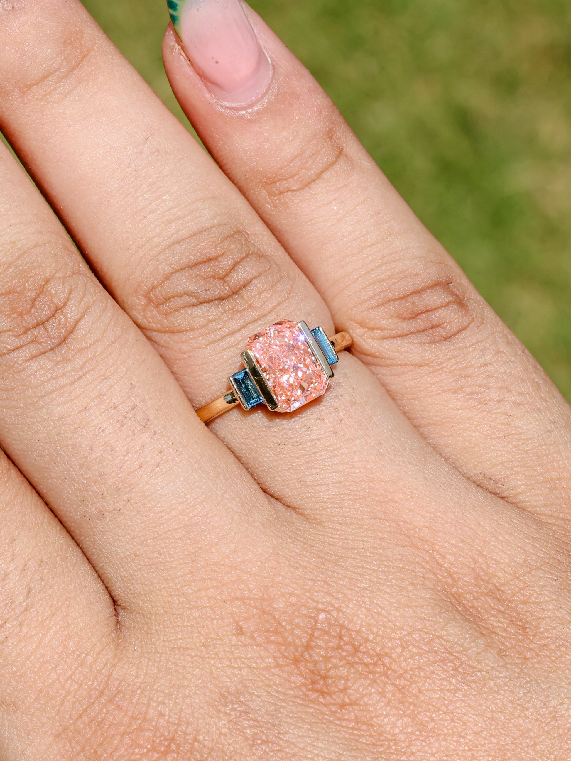 2.37 CT Pink Emerald Cut Lab Grown Diamond Engagement Ring with Blue Baguette Accent Stones  14K Yellow Gold