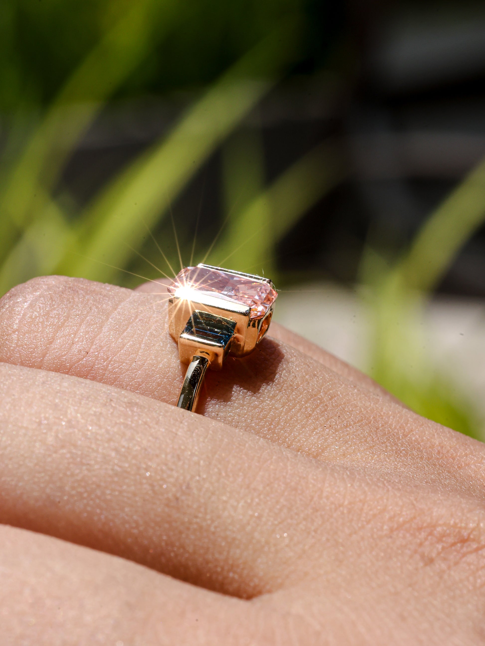 2.37 CT Pink Emerald Cut Lab Grown Diamond Engagement Ring with Blue Baguette Accent Stones  14K Yellow Gold