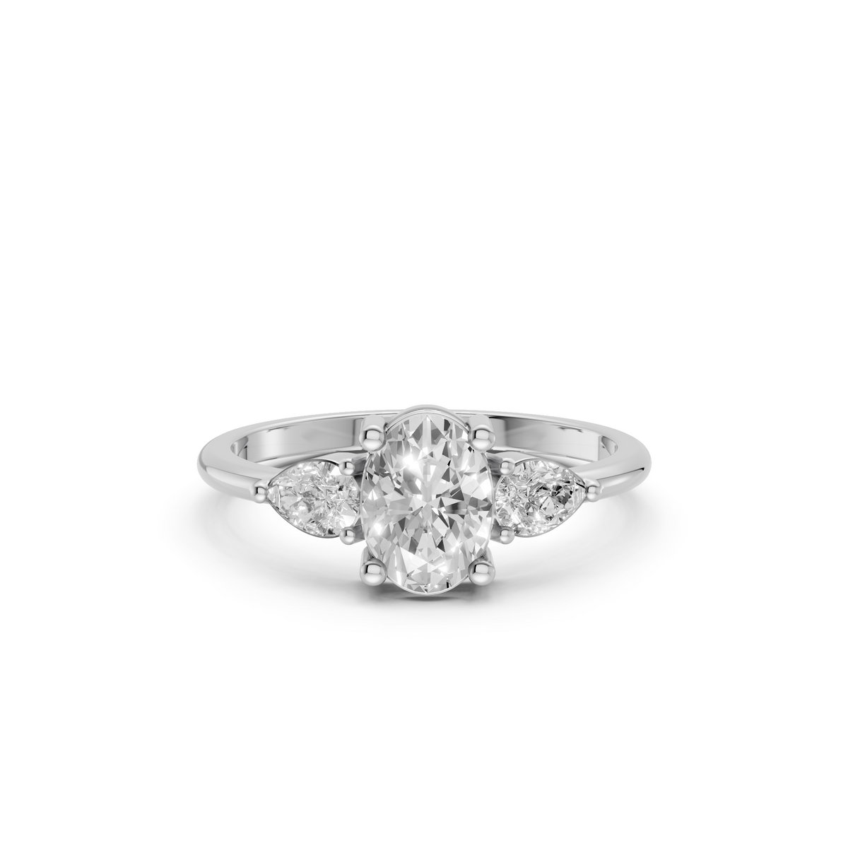 Three Stone Diamond with Oval Center & Pear Shape Ring