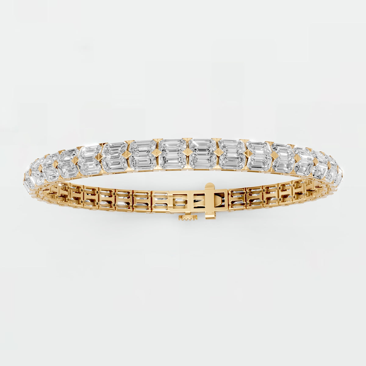 Emerald Cut Diamond Tennis Bracelet with Elegant Gold Prong Setting