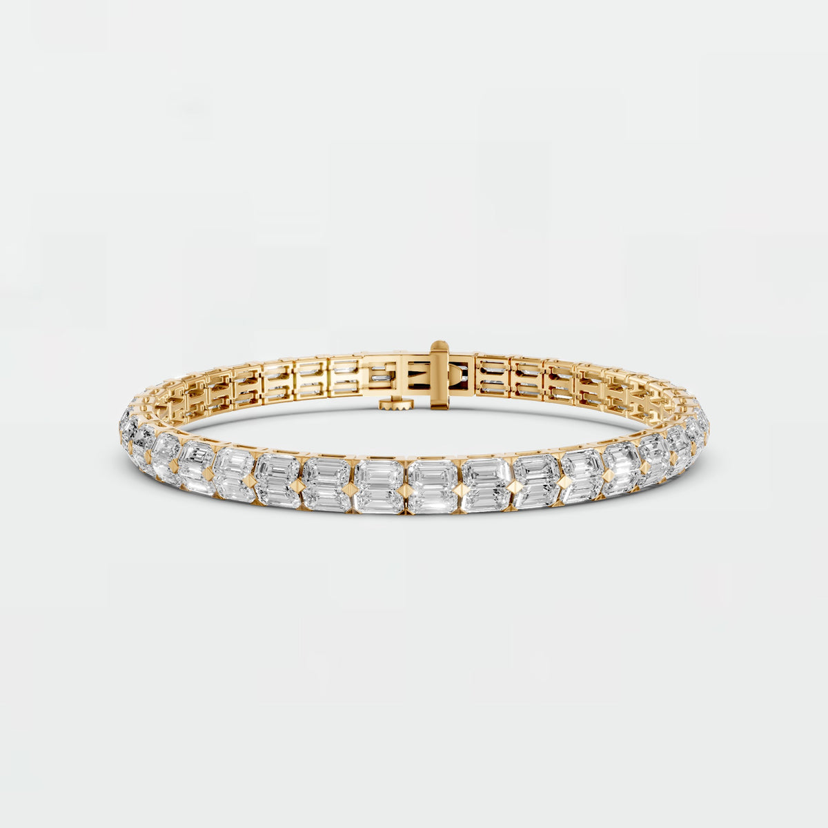 Emerald Cut Diamond Tennis Bracelet with Elegant Gold Prong Setting