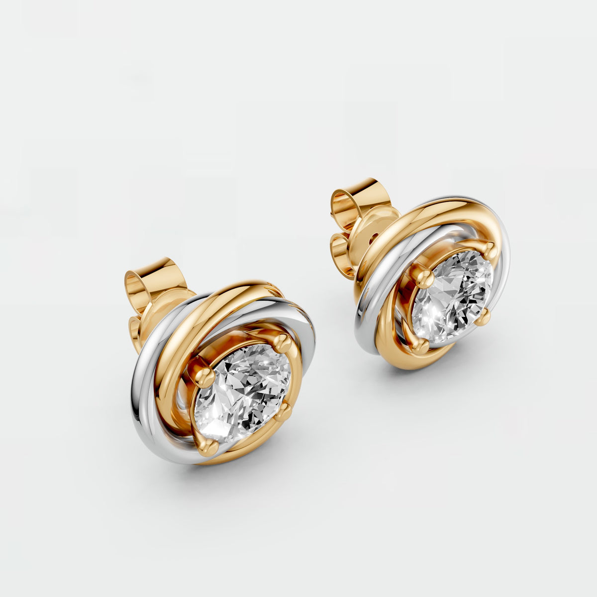 Two Tone interlocking Round Diamond Stud Earrings with Sculptural Gold Design