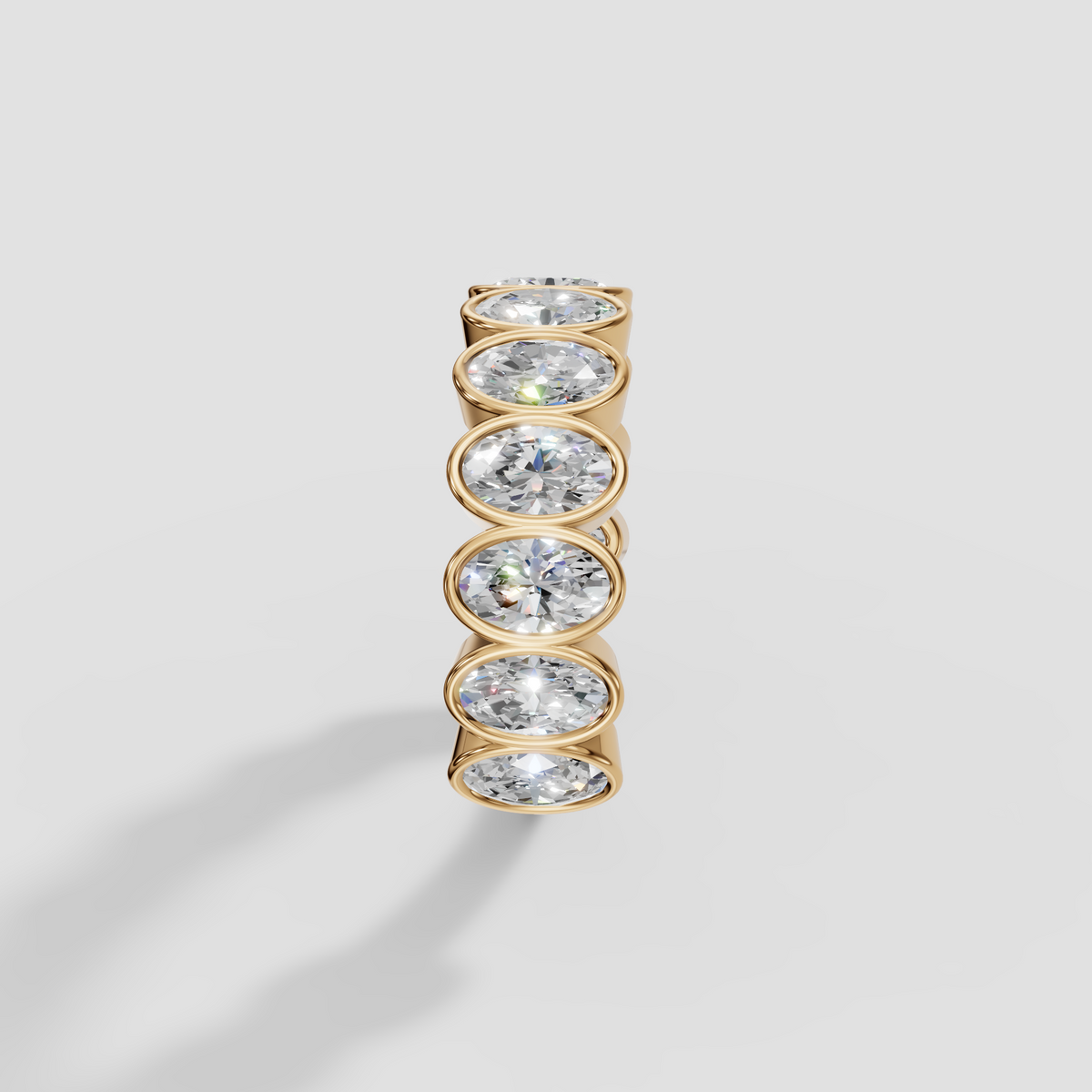 Oval Cut Diamond Eternity Bezel Set Band in 14K Gold